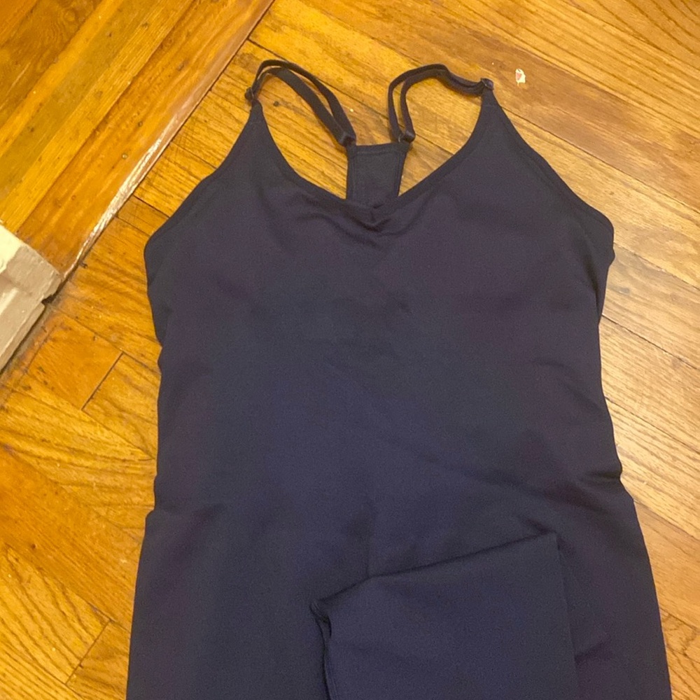 VS pink jump suit